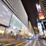 Photo of Tsim Sha Tsui Shopping District with Chanel and Louis Vuitton Fashion Shop in Harbour City Mall at Night time on August 23, 2018 in Tsim Sha Tsui, Kowloon, Hong Kong